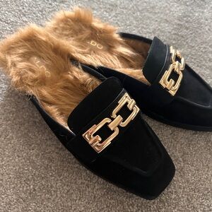 Brand new black slides with faux fur interior and gold buckle